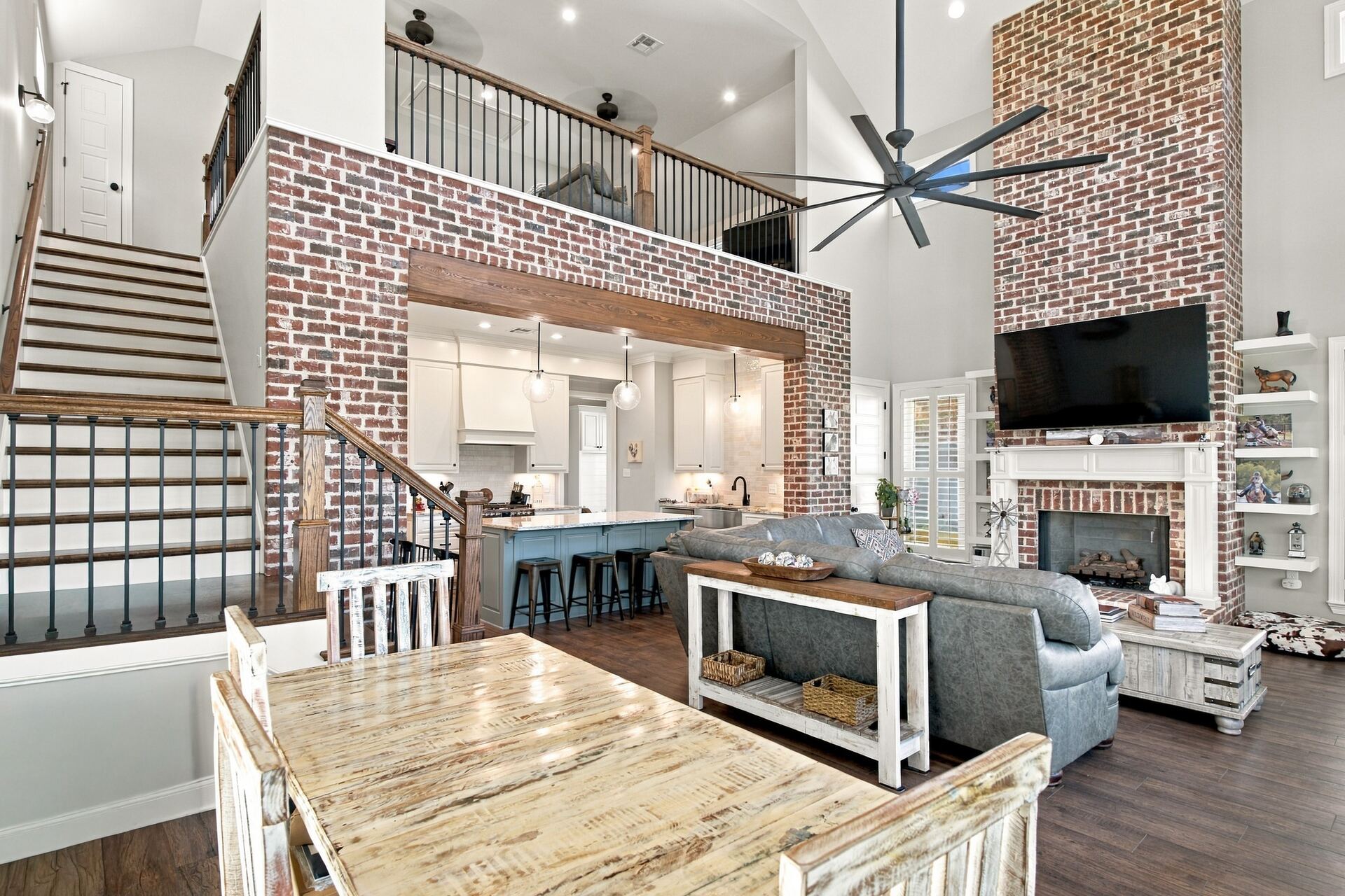 Entry, staircase and great room of a Lafourche Parish listing